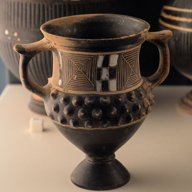 West Slope ware kantharos with geometric decoration and bosses