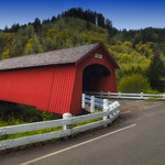 Fisher School Covered Bridge &lt;b&gt;BRIDGE NAME:&lt;/b&gt; Fisher School Covered Bridge
&lt;b&gt;OTHER NAME:&lt;/b&gt; Five Rivers Bridge
&lt;b&gt;COUNTY:&lt;/b&gt; Lincoln
&lt;b&gt;STREAM:&lt;/b&gt; Five Rivers
&lt;b&gt;NEAREST TOWN:&lt;/b&gt; Tidewater
&lt;b&gt;STATUS:&lt;/b&gt; Open to traffic
&lt;b&gt;BRIDGE LENGTH:&lt;/b&gt; 72 Feet
&lt;b&gt;YEAR BUILT:&lt;/b&gt; 1919
&lt;b&gt;ADDED TO NRHP:&lt;/b&gt; November 29, 1979
&lt;b&gt;REBUILT:&lt;/b&gt; 2004
&lt;b&gt;DEDICATED:&lt;/b&gt; 2005

&lt;b&gt;Other Notes:&lt;/b&gt; It was given the Fisher School title because of its location near the Fisher Elementary School, which is no longer standing.
