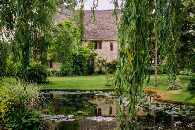 Willow pond reflections of Pigeon House, film 1996, Southam, Cotswolds, England