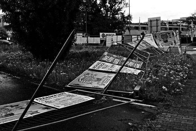 Overturned advertising posters
