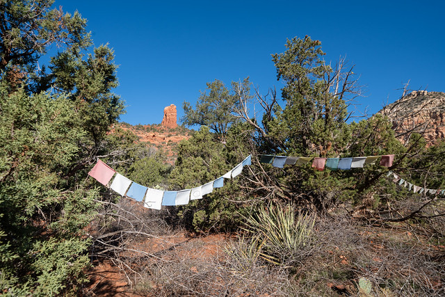 Prayer flags at Amitabha Stupa Buddhist Temple Park - in Sedona, Arizona on a sunny day