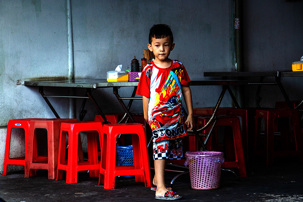 Boy in empty pho eatery at 6 11AM on 4-22-24--Vung Tau copy