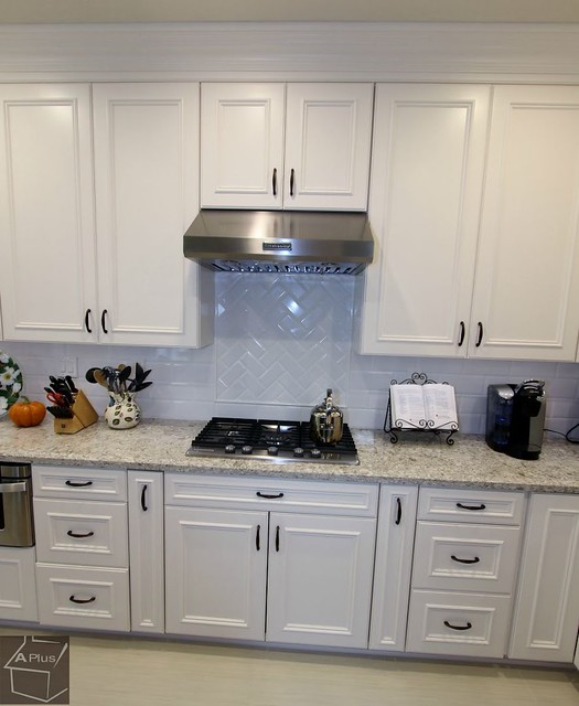 Transitional kitchen remodel with custom white cabinets and cambria quartz counter top in city of Laguna Hills Orange County https://www.aplushomeimprovements.com/portfolio_page/orange-county-laguna-hills-transitional-kitchen-home_remodel86/
