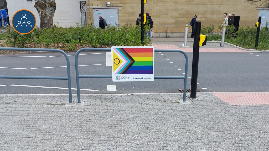 Crossing with pride sign