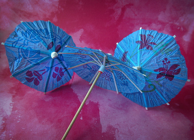 Three Paper Umbrellas