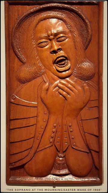 “The Soprano at the Mourning Easter Wake of 1968”  relief carved varnished walnut By-Daniel Pressley