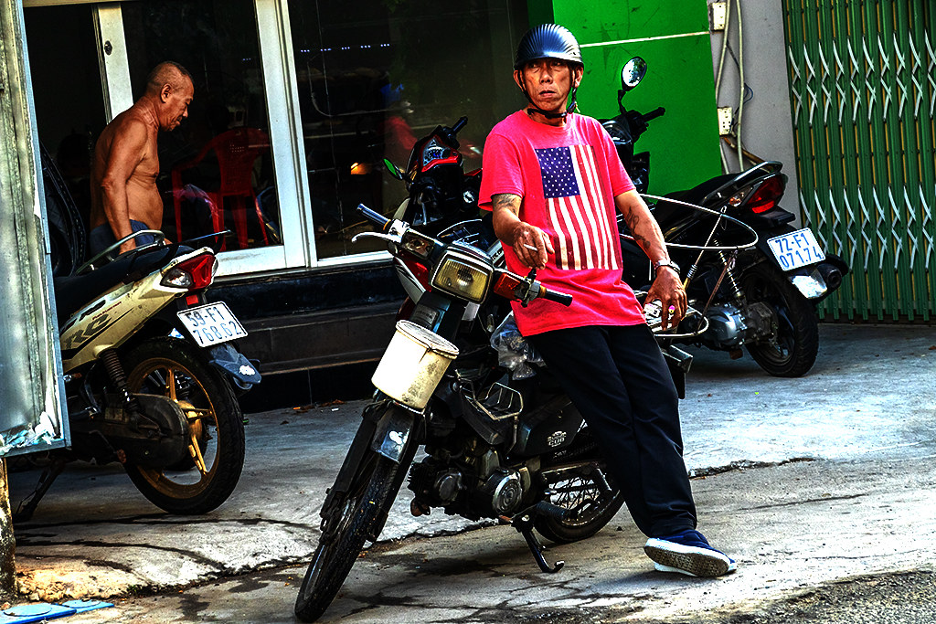 Bread delivery man in American flag shirt on 4-23-24--Vung Tau copy