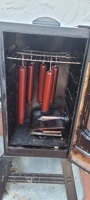Beef summer sausage in the smoker