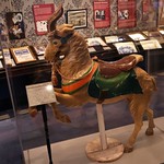 Annapolis - USNA Museum: Wooden Carousel Goat This is a rare and valuable carousel animal, made by the William F. Dentzel Company of Philadelohia, PA, in the period 1910-19.  He id not make it for the Academy, but it nonetheless represents the USNA mascot affectionately named Bill.  The Brigade purchased him in 1976, bur realizing it would be safer here, transferred it to the museum in 1978.


The United States Naval Academy Museum, located at Preble Hall within the Academy campus, features two floors of exhibits about the development and role of the U.S. Navy, spread across area of 12,000 square feet with four galleries.  The museum&#039;s history dates back to 1845, when it was founded as the Naval School Lyceum. In 1849, President James K. Polk directed the Navy&#039;s collection of historic flags be sent to the new Naval School at Annapolis for care and display, establishing one of the museum&#039;s oldest collections. The Naval Academy Lyceum of the 19th and early 20th centuries was located in several places around the Naval Academy Yard, before the construction of Preble Hall in 1939.   From 2007–2008, Preble Hall underwent a complete renovation to turn the building into a modern museum, which officially reopened in the summer of 2009.

The United States Naval Academy, the second oldest of the five U.S. service academies, was established in 1845 by Secretary of the Navy George Bancroft to educate midshipmen for service in the officer corps of the United States Navy and United States Marine Core.  Approximately 1,200 &amp;quot;plebes&amp;quot; enter the academy each summer.  About 1,000 midshipmen graduate and commission each year. The 338-acre campus, known as the &amp;quot;Yard,&amp;quot; is located on the former grounds of Fort Severn, and is home to  many historic sites, buildings and monuments.