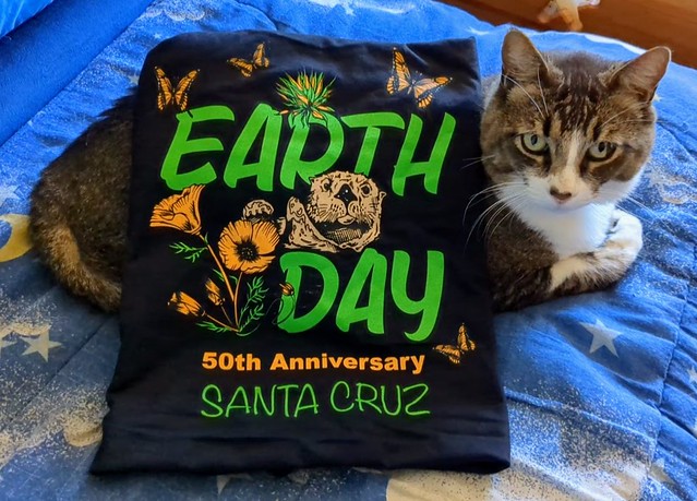 Happy Earth Day! Here's Oswald with one of the shirts I got at Saturday's 2024 Earth Day Event: Abbott Square & Downtown Santa Cruz celebration.