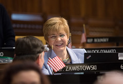 State Rep. Tami Zawistowski shares a laugh with a colleague during a session day in the House of Representatives on April 23, 2024.