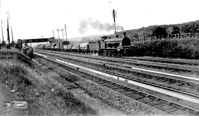A LNWR class E 2-8-0 at Whitmore troughs