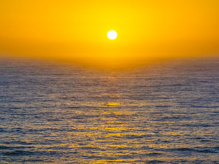 Summer sunrise at the seaside bay