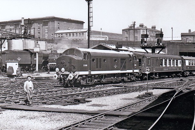 EE Type 2 Baby Deltic D5908 bringing empty Pullman stock into King's Cross in 1961. A Gresley A3 Pacific is in the background.