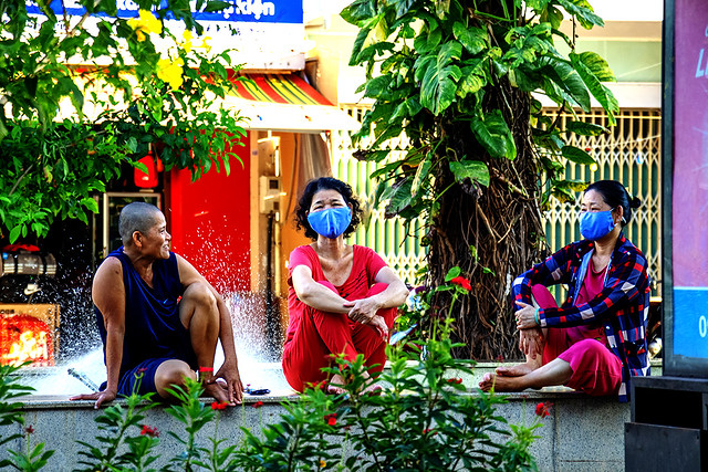 Two masked women and an unmasked woman on 4-25-24--Vung Tau copy