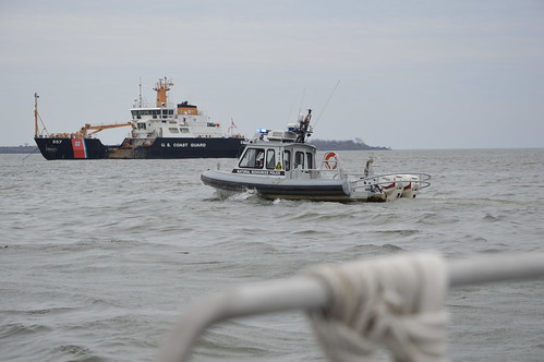 NRP and U.S. Coast Guard vessels patrol the Patapsco River.