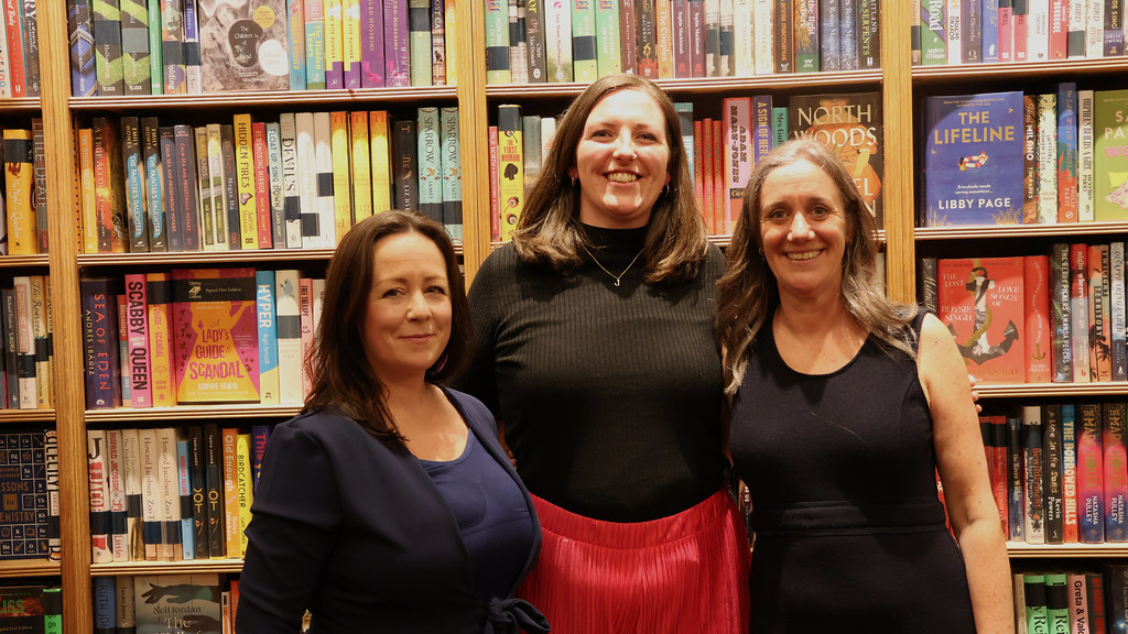 Dr Rachel Paskell, Dr Juliet Young and Dr Catherine Butler stand in front of book shelf at Toppings, 49ͼϴȫ 