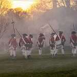Re-enactment of Battle of Lexington. British regulars firing. 