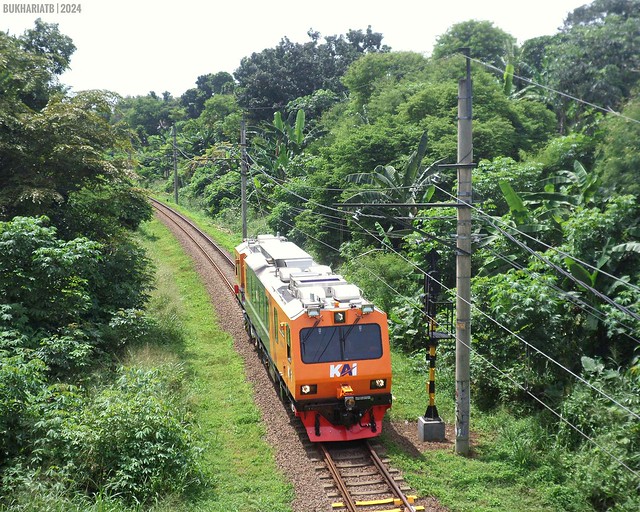 Railroad and Upstream Electric Measure Train named Arjuna passing under Nambo viaduct.