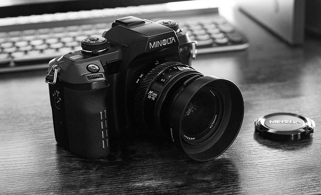 Glam shots of the Minolta Maxxum 7 film camera ca 2004 (from the Minolta Maxxum 50mm f1.7 lens on my Sony A7M4)