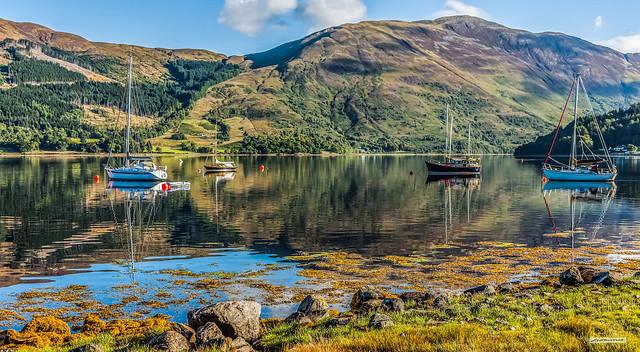 The lustrous waters of Loch Leven, a sea-loch or fjord of stupendous beauty, looking from Argyll to Inverness-shire, Scotland.