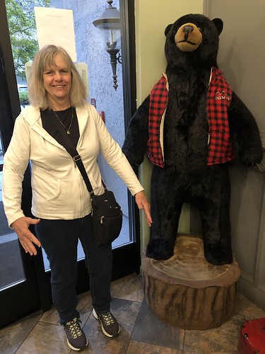 Mary imitating the greeting bear at the Yosemite View Lodge 