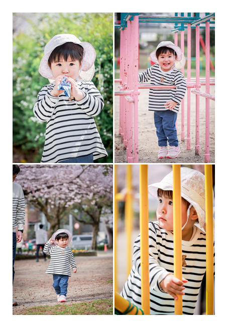 桜満開の公園で遊ぶ２歳の女の子