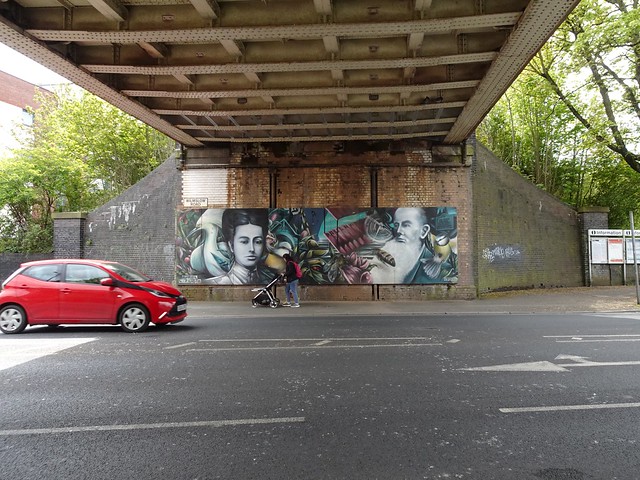 Qubek street art under East Didsbury railway bridge