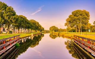 Still reflections. Wilhelminakanaal, village of Aarle-Rixtel, The Netherlands.