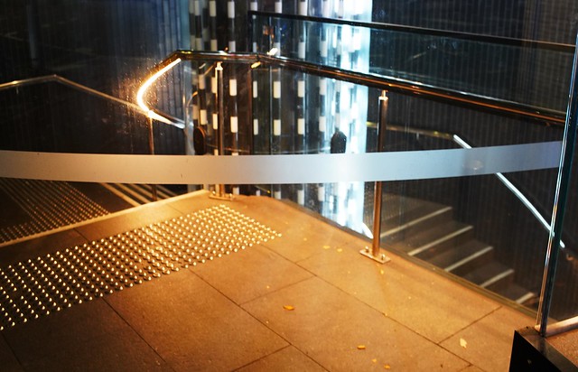 Railway Station entrance with brightly lit handrail