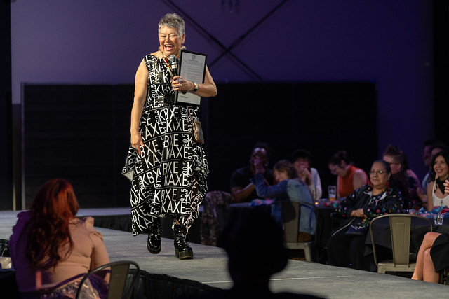 Ojibwe designer Delina White on the runway at Native Nations Fashion Night in Minneapolis