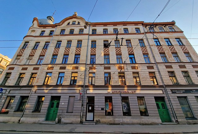 Anno 1907: Art nouveau tenement house with shops at corner of Tallinas Street and Krišjāņa Barona Street in central Riga, Latvia. April 28, 2024