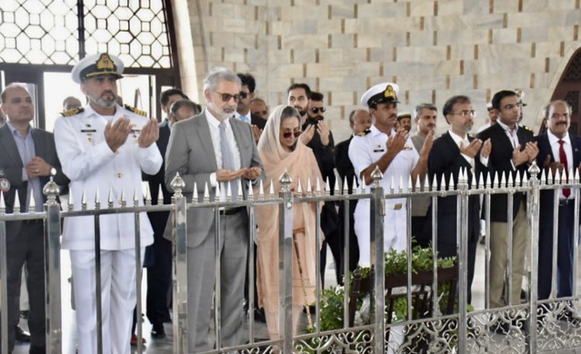 Chief Justice of Pakistan Justice Qazi Faez Isa paying his respects at the mausoleum of the Founder yesterday