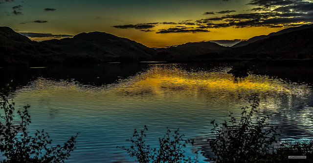 Roamin' in the Gloamin'. At 21:00, almost into autumn, the dying embers of a glorious day, dance on the lustrous waters of Loch Eilt, on the iconic 