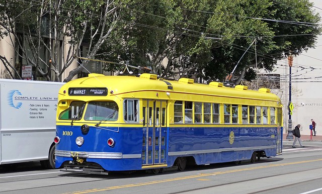 San Francisco Muni Line F: 1010 (San Francisco Muni 1940's colors) on Steuart Street