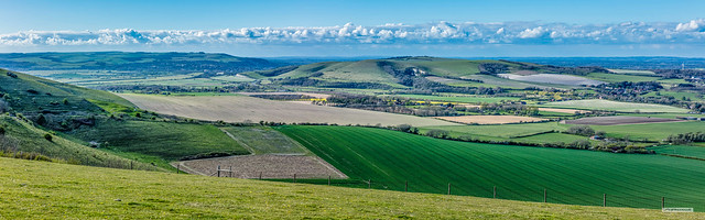 Panorama of the Lewes area of East Sussex. Glyndebourne Operatic Theatre is upper right, near Glynn Village. Mount Caburn, popular for Hang-Gliding, is centre and Lewes in the valley of the River Ouse is left of centre, East Sussex, England