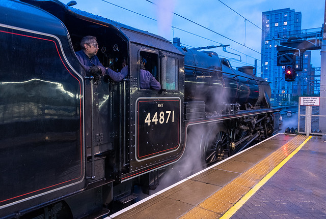 60291 LMS Black Five locomotive no. 44871 heading the return Bath and Gloucester Steam Express, at Reading station, Berkshire, United Kingdom