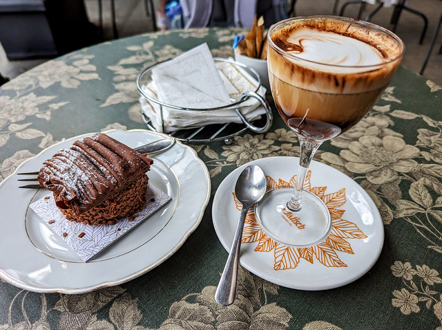 Traditional Torinese drink bicerin with three layers: milk, espresso, and drinking chocolate