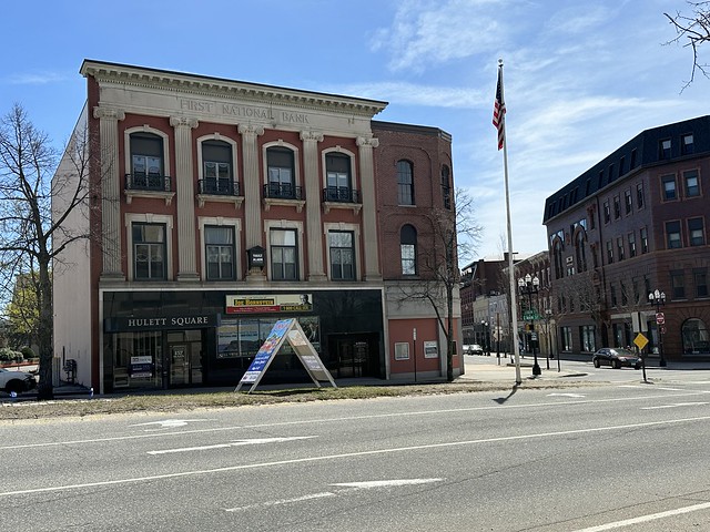 First National Bank Building. 157-163 Main Street. Lewiston, Maine. Built in 1871. Neoclassical facade added in 1903. NRHP designated. Contributing Building to the NRHP District.