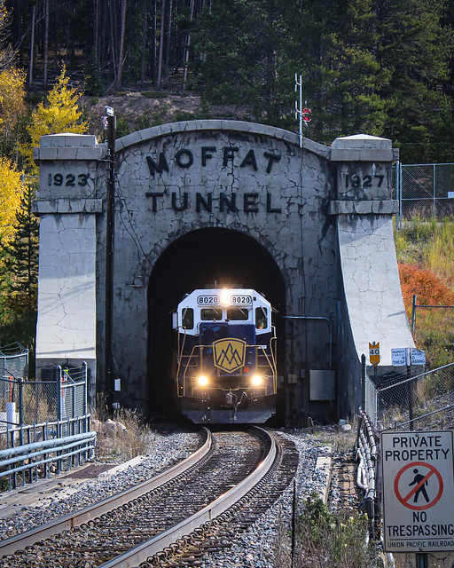 Rocky Mountaineer GP40-2 8020 leads the train out of Moffat Tunnel in Winter Park, CO.