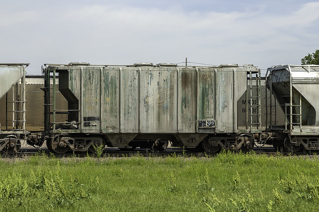 Cement stained, CNW 96585, 2-bay covered hopper car, eastbound on the UPRR Omaha Sub at Omaha NE 5-14-07 © Paul Rome