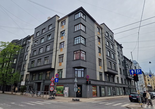 Anno 1932: tenement house with shops at corner of Stabu Street and Baznīcas Street in central Riga, Latvia. April 29, 2024