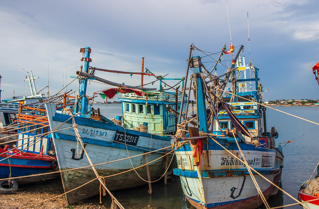 Fisherman's boats at the Fishing Pier of Pattaya Naklua District Chonburi in Thailand Southeast Asia