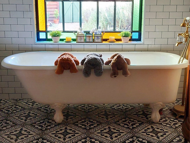 Teddy bear group in tub