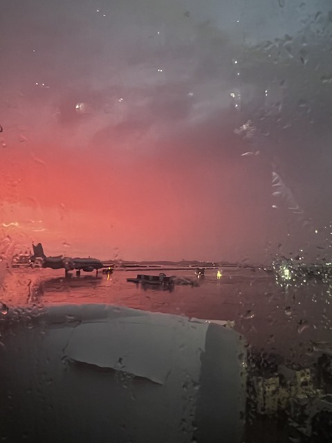 Rainy pink dawn at Logan