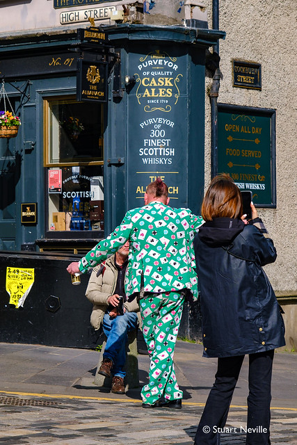 I don’t know what the woman was photographing but she was missing the guy with this amazing suit