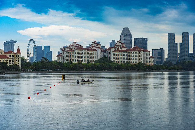 Kallang river basin with city skyline and reflections on a rainy morning in Singapore
