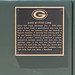 Green Bay, Wisconsin - June 2, 2023: Love at first leap plaque statue explaining when LeRoy Butler leaped into arms of fans