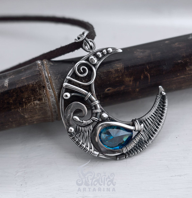 Silver wire wrapped moon necklace