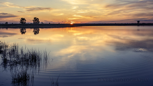 Concentric rings on clouds by VFR Photography, An exceptionally calm evening a few nights ago found me just across the Missouri River south of Will